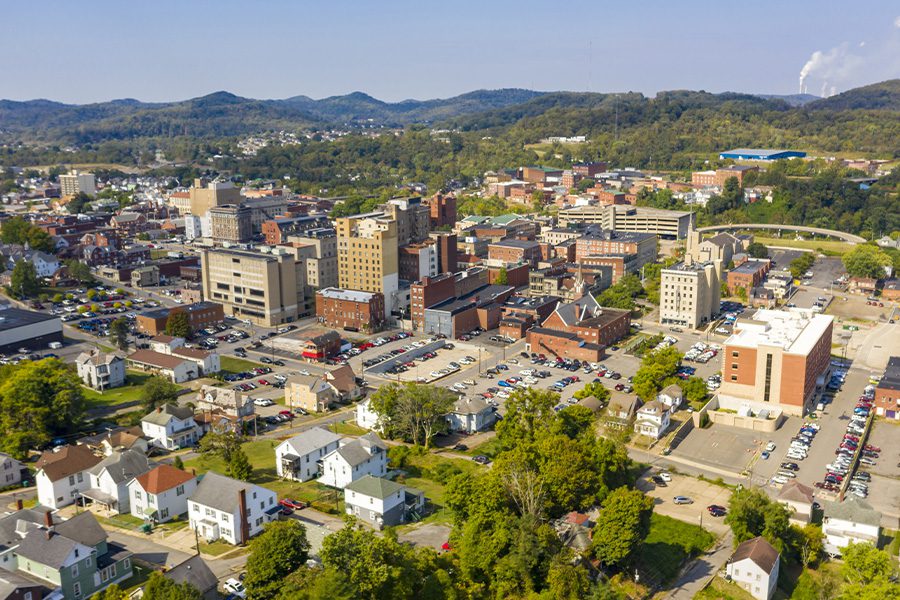 Beckley, WV - Aerial Perspective with Bright Sun in the Late Afternoon of a Town in West Virginia